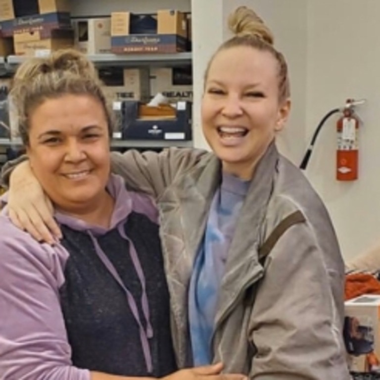 Sia with shoppers at Walmart on Thanksgiving Eve, 2019. Pics: Twitter.