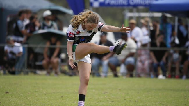 Action in the under 14 girls Maori v Barbarians game.