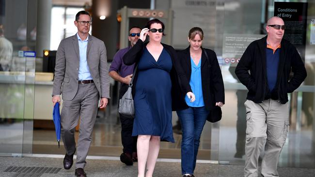 Senior Constable Bronwyn Smith and her husband (right in sunglasses) Senior Constable Drew Carmichael. Picture: John Gass