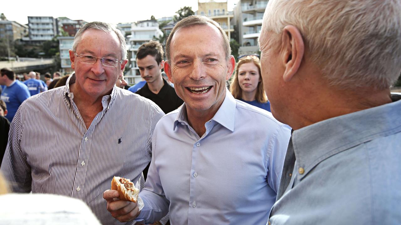Tony Abbott having a laugh with NSW Liberal MP for Wakehurst Brad Hazzard and a friend, at the launch of his campaign in 2016. Picture: Adam Yip/ The Australian