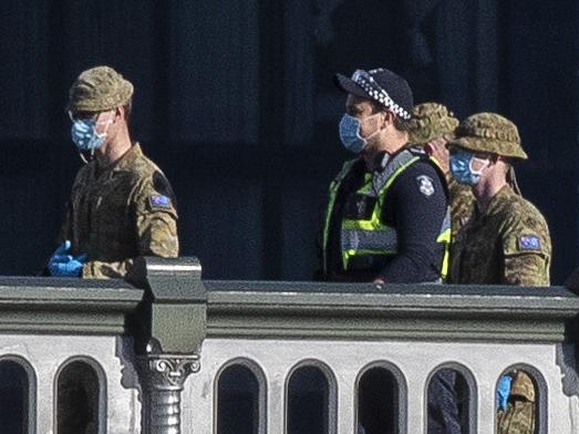 MELBOURNE, AUSTRALIA - NewsWire Photos AUGUST  02 2020: Police officers and ADF personnel patroling Melbourne CBD .Picture: NCA NewsWire / David Geraghty