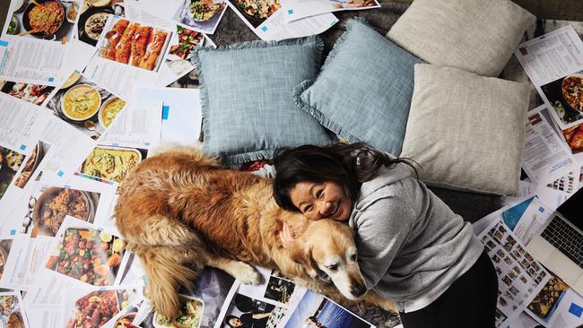 Nagi Maehashi checking book proofs with Dozer. Picture: Rob Palmer