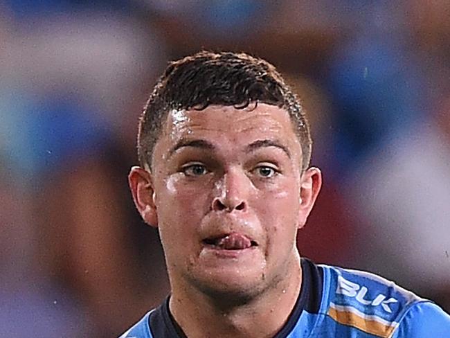 GOLD COAST, QUEENSLAND - APRIL 01: Ash Taylor of the Titans kicks the ball during the round five NRL match between the Gold Coast Titans and the Brisbane Broncos at Cbus Super Stadium on April 1, 2016 in Gold Coast, Australia. (Photo by Matt Roberts/Getty Images)