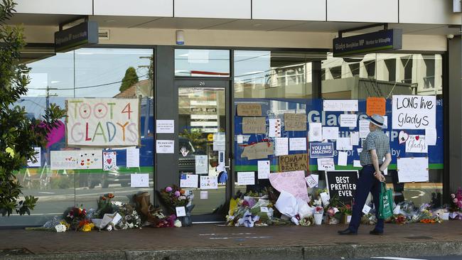 A photo of tributes left at former Premier Gladys Berejiklian's Electoral office in Northbridge after her resignation.