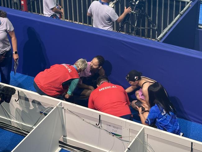 Rikako Ikee collapse on pool deck in Paris.