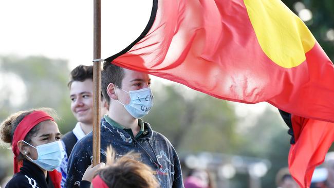 Leanna Hunter and Max Mellin (holding flag) attend the Cotton Tree Black Lives Matter protest. Picture: Patrick Woods