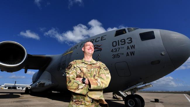 Exercise Mobility Guardian. USAF pilot Captain Stefan Curcic with 'Moose' the C-17 Globemaster he pilots at RAAF Base Townsville. Picture: Evan Morgan