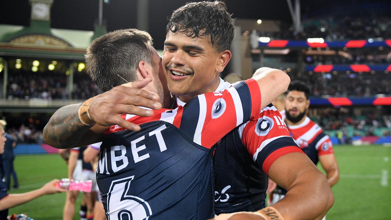 Latrell Mitchell and Luke Keary celebrate their preliminary final win over the Storm.