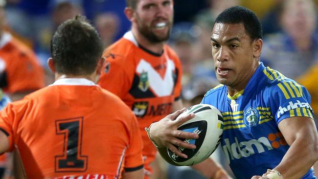 Will Hopoate of the Eels breaks through Tigers defence.