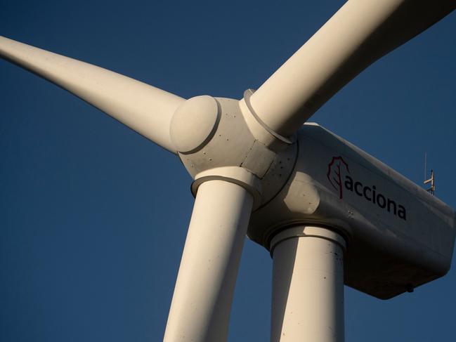 An Acciona wind turbine is pictured in Tarifa, southern Spain, on January 24, 2025. (Photo by JORGE GUERRERO / AFP)