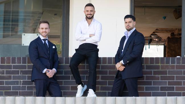 Luxury homes real estate agent Gavin Rubinstein outside his new Rose Bay office. Pictured Left is Oliver Lavers and right is Cae Thomas. Picture - Chris Pavlich for The Australian