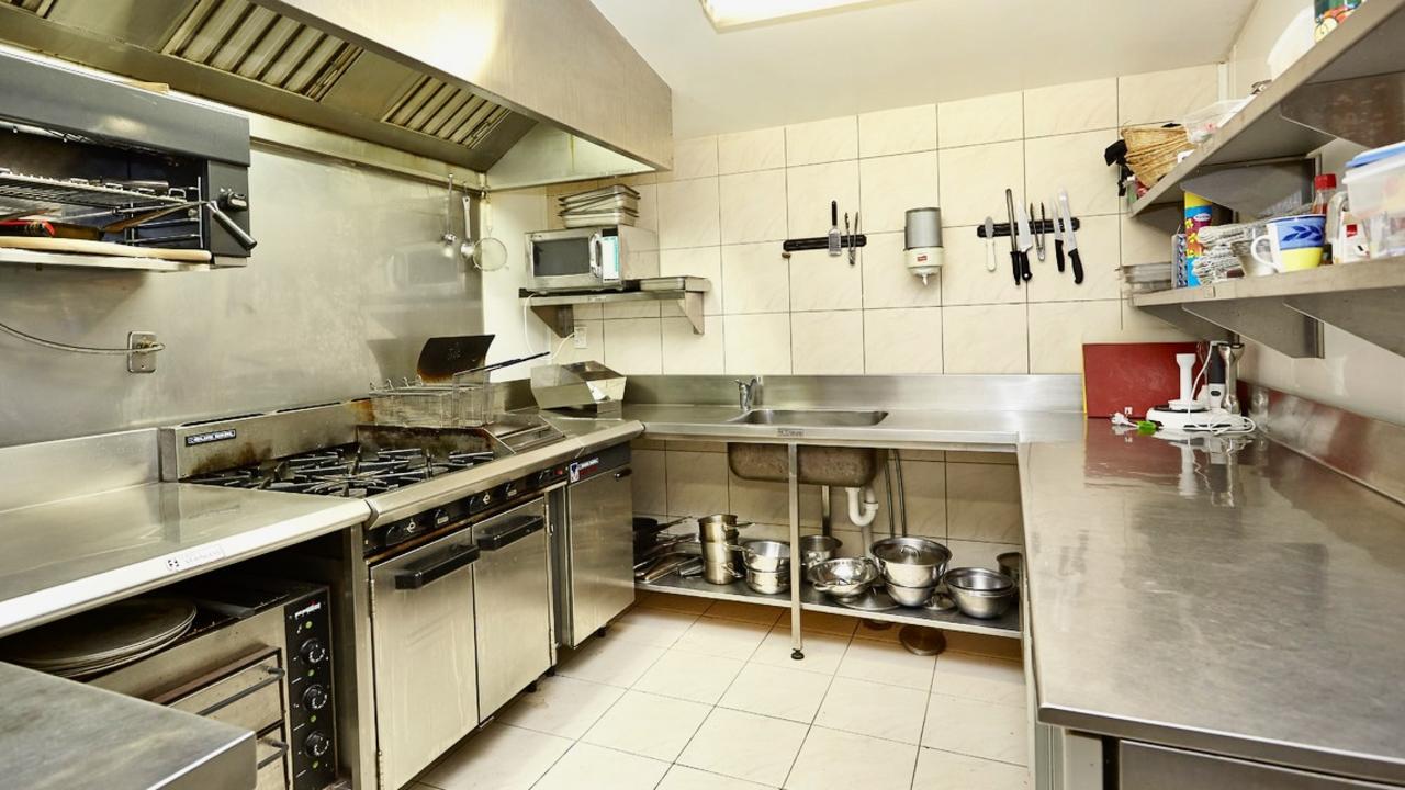 A fully kitted out commercial kitchen was set up for the owner’s daughter who ran a restaurant for two years there. Picture: One Agency The Property Specialists.