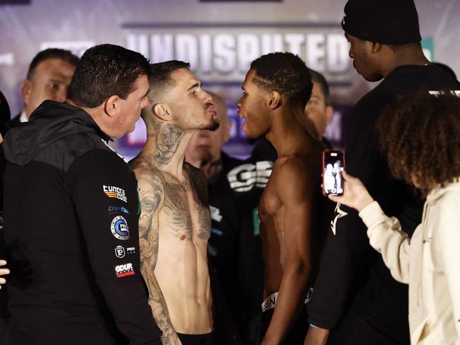 George Kambosos Jr and Devin Haney face off during the weigh in. Picture: Darrian Traynor/Getty Images