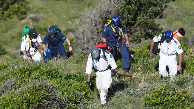 Police rescue search bushland in Byron Bay after the disappearance of Theo Hayez in 2019.