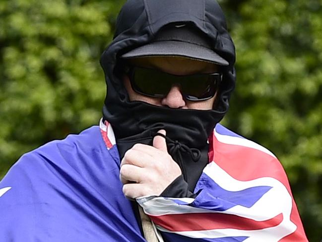 Members of the True Blue Crew are seen during their Aussie Flag Solidarity March in Penrith, Sydney, Saturday, June 22, 2019. The extreme right wing group was supported by alleged Christchurch terrorist Brenton Tarrant and has been banned from Facebook for Islamophobic comments. (AAP Image/Bianca De Marchi) NO ARCHIVING