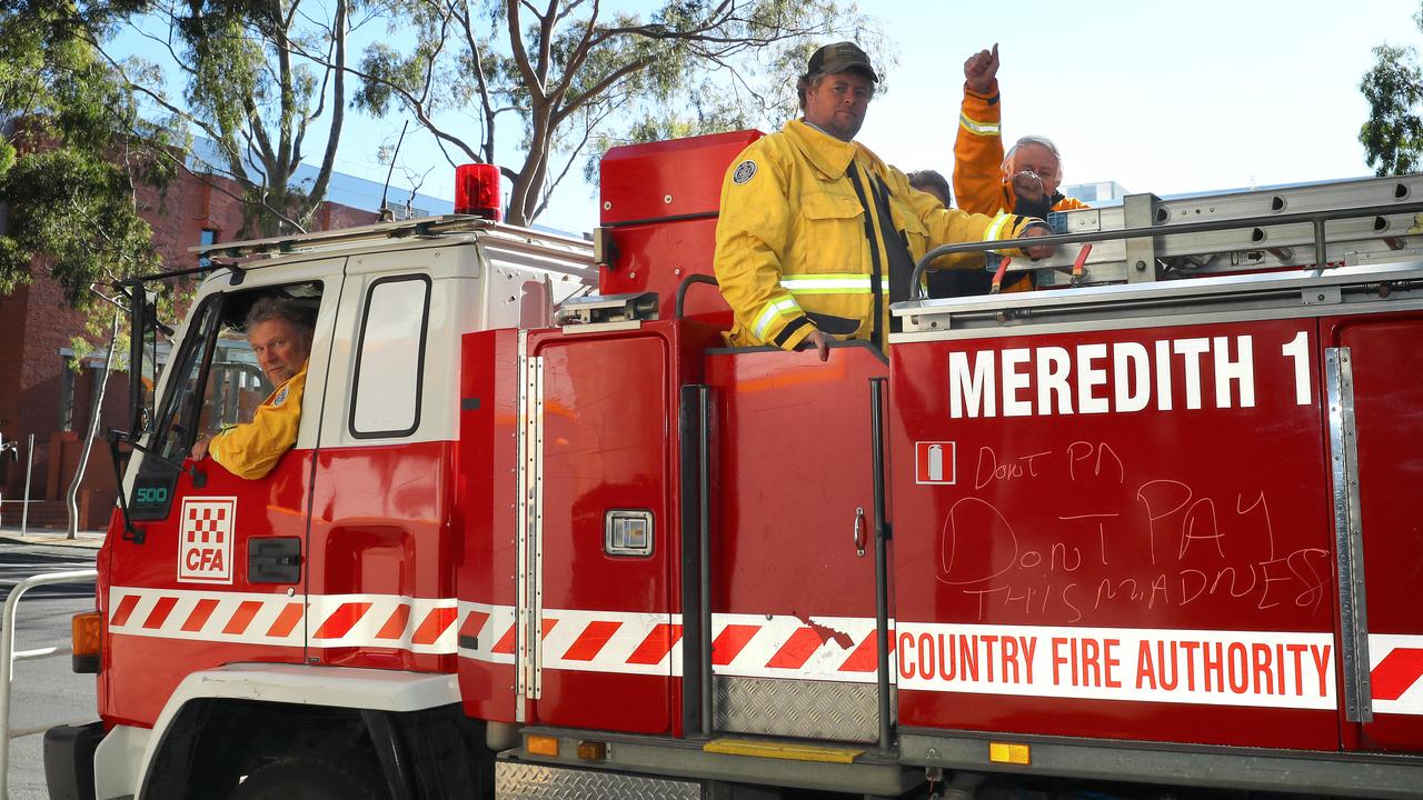 CFA volunteer firefighters and their trucks line the streets of Geelong to protest the fire levy. Picture: Alison Wynd