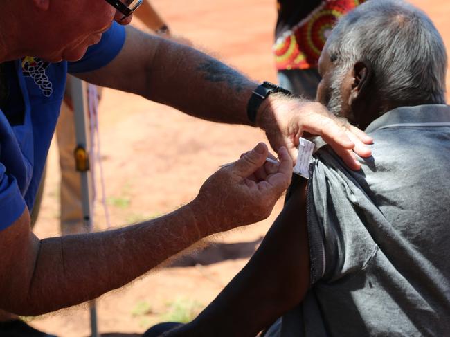 A Beagle Bay community member receives a coronavirus vaccine in the remote Aboriginal community in the Kimberley region. Picture: AAP Image/Supplied by Kimberley Aboriginal Medical Services