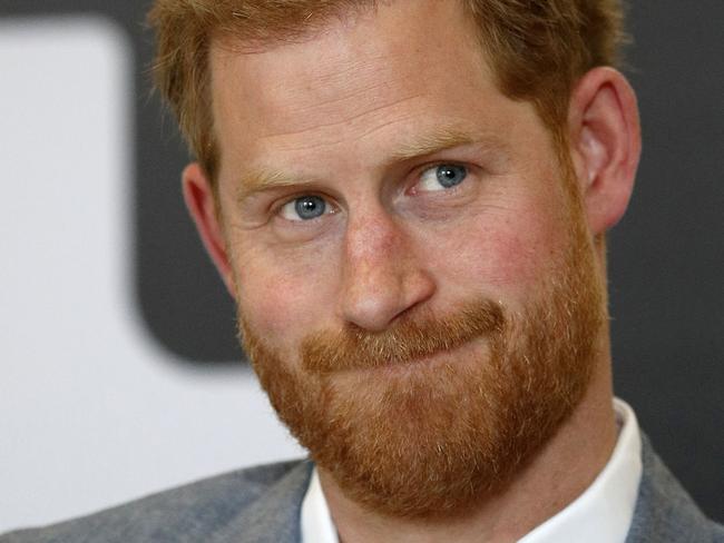 (FILES) In this file photo taken on April 03, 2019 Britain's Prince Harry, Duke of Sussex smiles during a discussion, while on a visit to YMCA South Ealing in west London to learn more about their work on mental health and see how they are providing support to young people in the area. - Britain's Prince Harry announced on April 10, 2019, that he is teaming up with US celebrity talk show host Oprah Winfrey on a documentary series for Apple about mental health. The Duke of Sussex, who is set to become a father this month, will jointly create and executive produce the upcoming mental health-themed show with Winfrey, according to Kensington Palace, his official residence. (Photo by Adrian DENNIS / POOL / AFP)