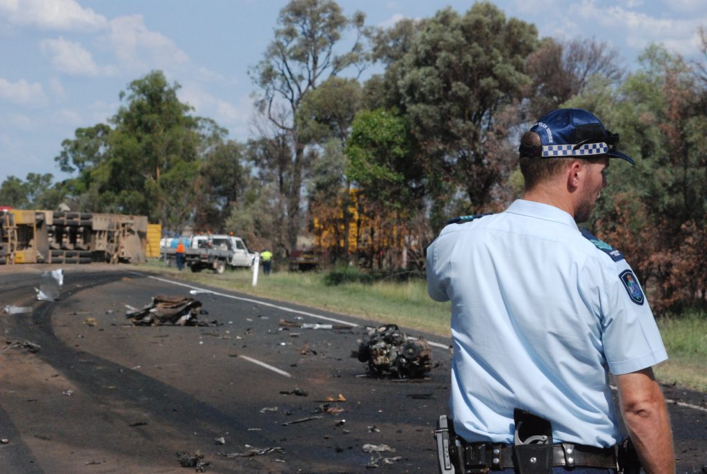 The wreckage of a fatal crash near Chinchilla. The cattle truck can be seen overturned in the distance. Picture: Alasdair Young