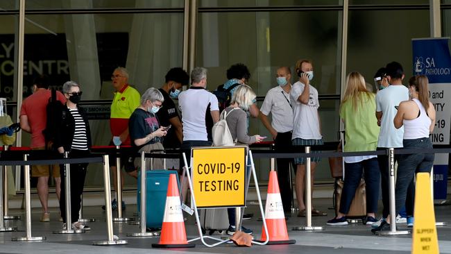 People line up to get tested for COVID outside of Adelaide Airport. Picture: Naomi Jellicoe