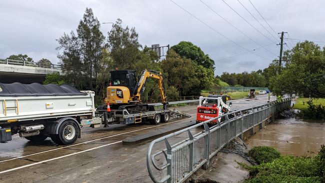 Council cleaning up on Siganto Drive at Helensvale on Tuesday. Picture: Keith Woods