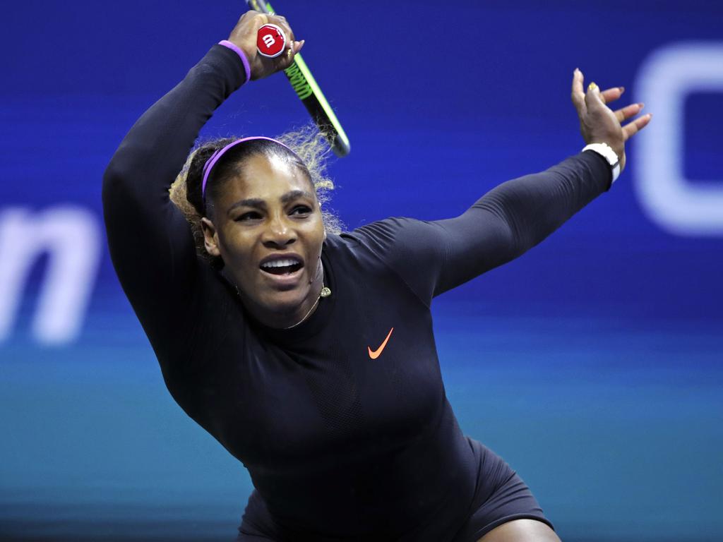 Serena Williams returns to Maria Sharapova. (AP Photo/Charles Krupa)