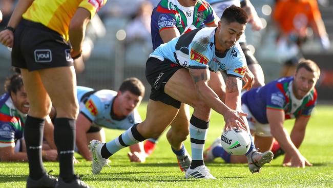 Shaun Johnson of the Sharks scores a try during the round 10 NRL match between the New Zealand Warriors and the Cronulla Sharks at Central Coast Stadium.