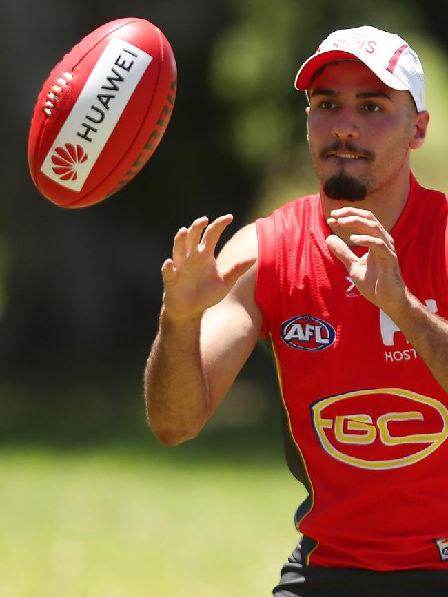 Gold Coast’s Izak Rankine at training on Monday. Pics: Getty Images