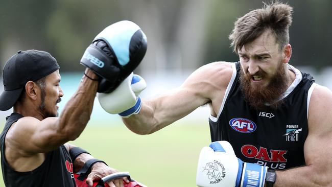 Charlie Dixon doing a boxing session with Daniel Buberis at pre-season training in Noosa. Picture: Sarah Reed