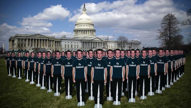 Cutouts of Facebook chief executive Mark Zuckerberg are displayed outside the Capitol building ahead of his testimony this week. Picture: Bloomberg