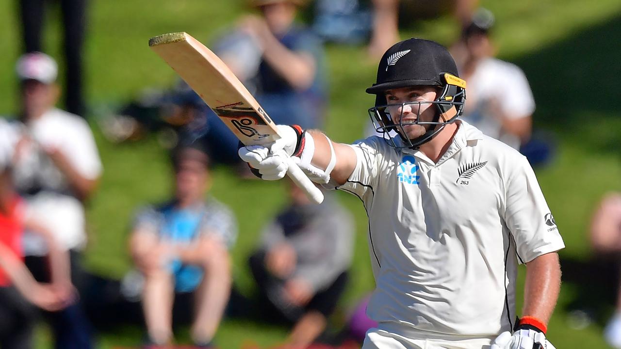 New Zealand's Tom Latham celebrates reaching 250 .