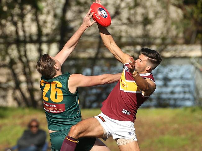 Kyle Galloway and Thomas Blake battle in the ruck. Picture: Hamish Blair