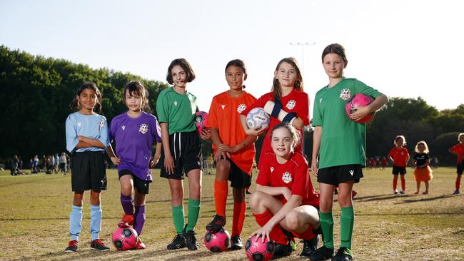 Newcomers Kyla Rodriques, Maisy Parsons, Violet Hick, Harriet Galanos, Lorelei Kurzel, Sophie Worsfold and Liberty Laing are among the many girls trying soccer at Mackey Park for the first time, spurred on by the Matildas in the Women’s World Cup. Picture: Richard Dobson