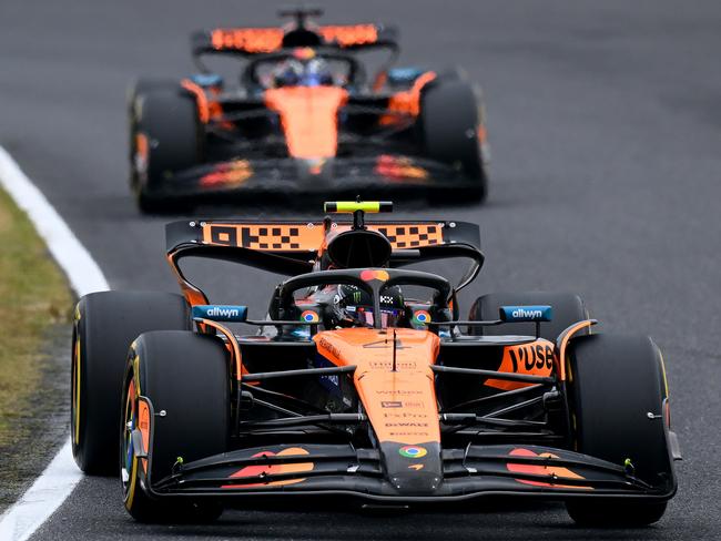 SUZUKA, JAPAN - APRIL 06: Lando Norris of Great Britain driving the (4) McLaren MCL39 Mercedes leads Oscar Piastri of Australia driving the (81) McLaren MCL39 Mercedes on track during the F1 Grand Prix of Japan at Suzuka Circuit on April 06, 2025 in Suzuka, Japan. (Photo by Clive Mason/Getty Images)