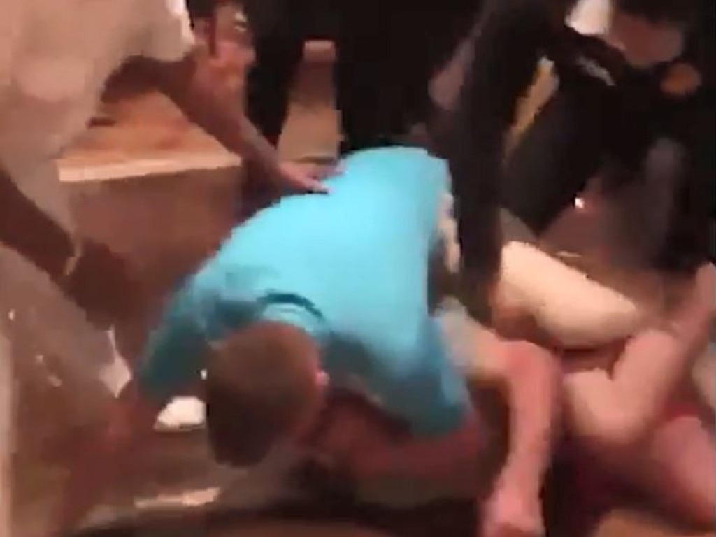 Screen grabs from footage of the brawl aboard the Carnival Legend cruise ship in 2018.