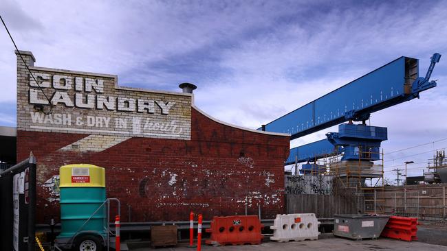 Wet and windy weather has been blamed for delaying the reopening of Murumbeena railway station.