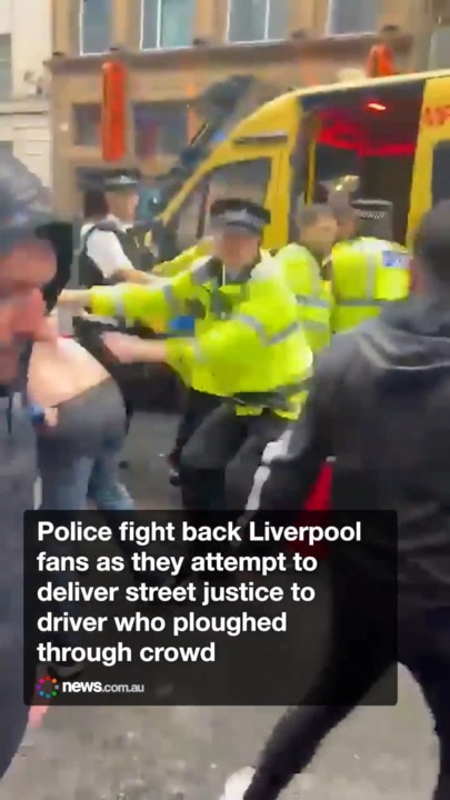 Liverpool fans attempt to deliver street justice to driver who ploughed through crowd