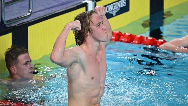 Australia's Sam Short celebrates winning and taking the gold medal