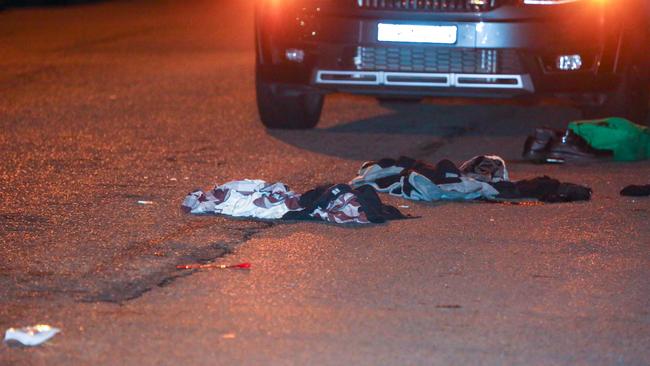 A car was damaged and clothing strewn on the road after a car allegedly collided with a pedestrian on Friday night in Fairfield Heights.