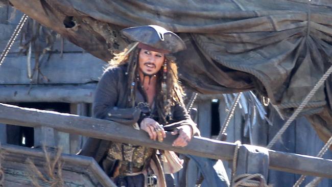 The real Johnny Depp shooting scenes on board The Dying Gull on the set of Pirates of the Caribbean: Dead Men Tell No Tales at The Spit. Pics Tim Marsden