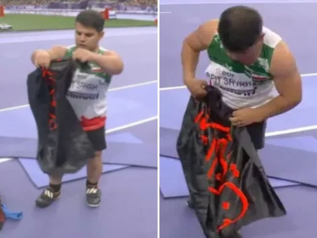 Athlete stripped over banned flag