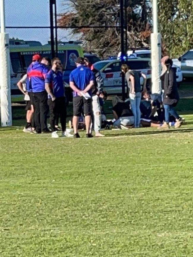 Keysborough trainer Rhiannon Smith and Skye’s Briesha Bormann perform CPR on Jojo Ofosu-Amaah. Picture: Supplied