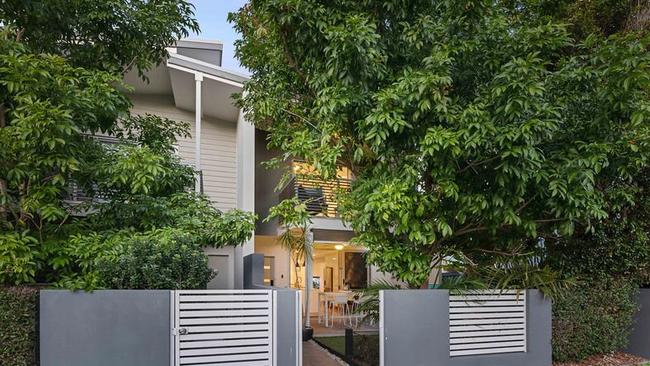 This townhouse at 5/19 Kennington Rd, Camp Hill, sold above reserve for $909,000 at auction.