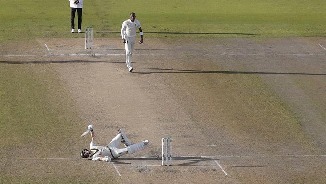 Steve Smith falls to the ground after being hit in the head off delivery from Jofra Archer. Picture: Getty Images