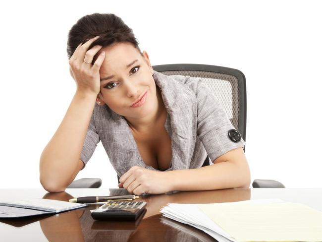A woman sorting out her financial affairs at tax time. Picture: iStock.