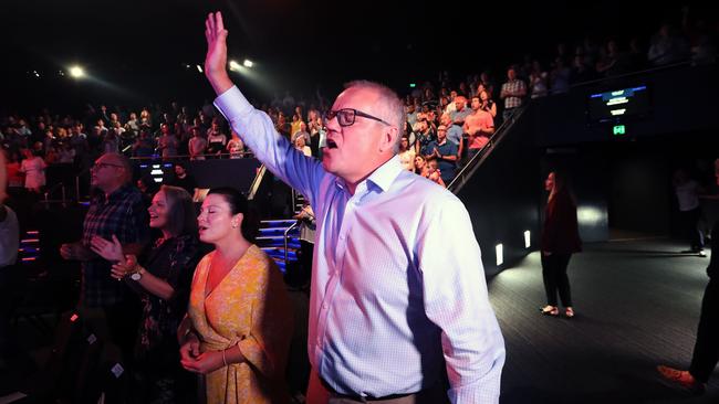 Prime Minister Scott Morrison with his wife Jenny on Easter Sunday at the Horizon Church in Sutherland. Picture: Gary Ramage