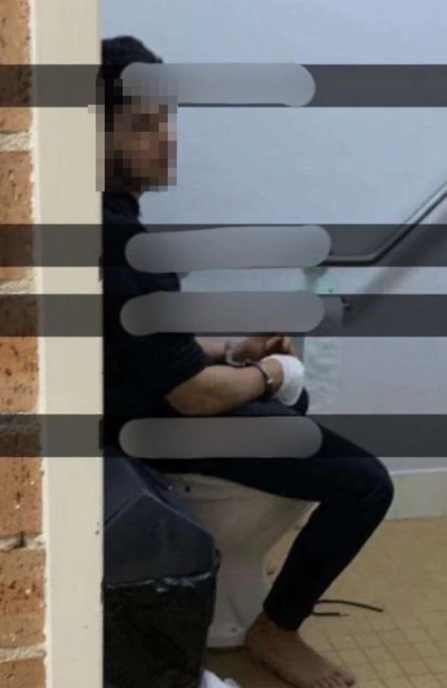 Pictured the 16 year old who stabbed Bishop Mar Mari Emmanuel at The Good Shepherd Church in Wakeley last night sitting on a toilet with a bandaged hand. Picture Twitter