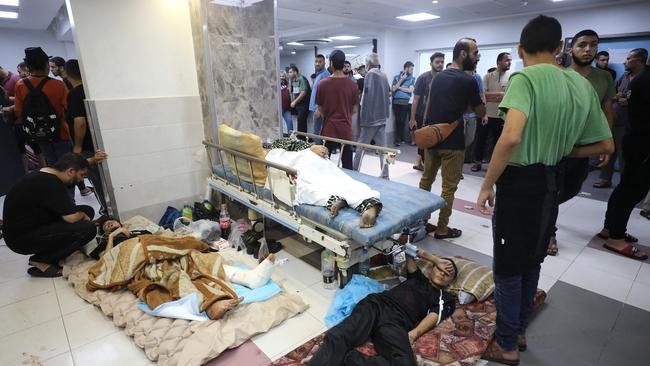 Wounded Palestinians receive treatment at the Al-Shifa hospital in Gaza City. Picture: AFP.