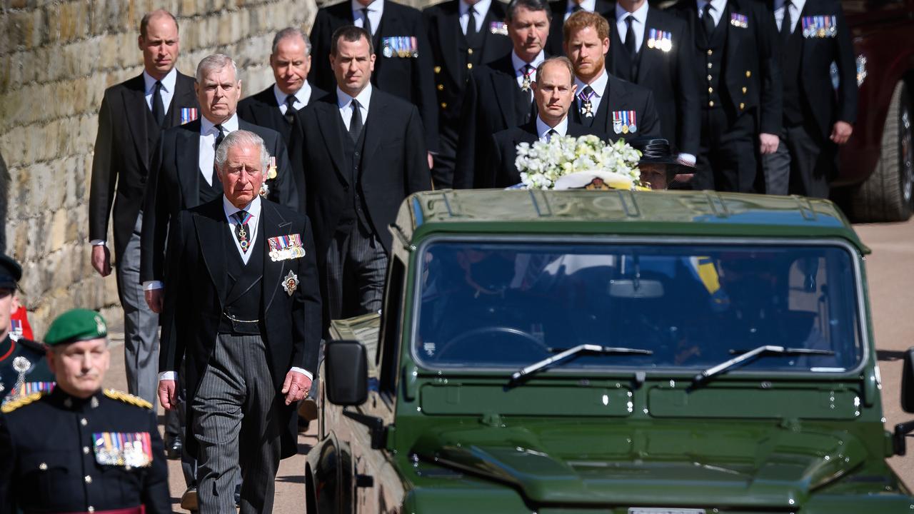 Prince Charles leads members of the royal family behind Prince Philip’s Land Rover at Saturday’s funeral procession. Picture: Leon Neal/Getty Images