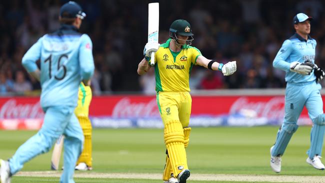 Steve Smith shows his frustration after being dismissed by Chris Woakes for 38 in Australia’s preliminary phase win over England. Picture: Getty Images